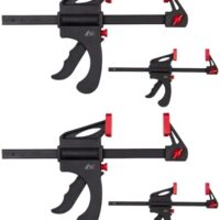 Vier Einhandzwingen mit Stahl- und Nylon-Konstruktion, ideal für Heimwerker und Bastler, um Holz und andere Werkstoffe sicher zu fixieren.