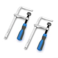 Zwei Metall-Schwalbenschwanz-Klemmen mit verstärktem Schiebearm für Holzbearbeitungsprojekte